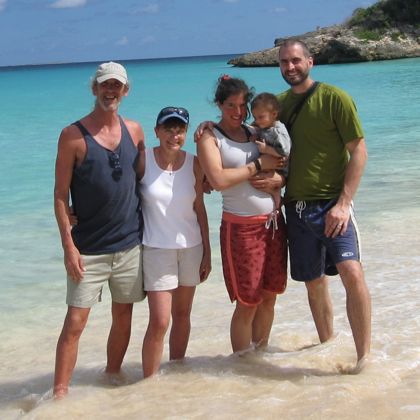 picture of Andy with his wife, pregnant daughter-in-law, grandson, and son.